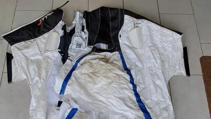 white wignsuit ripped apart / wingsuit blanche découpée