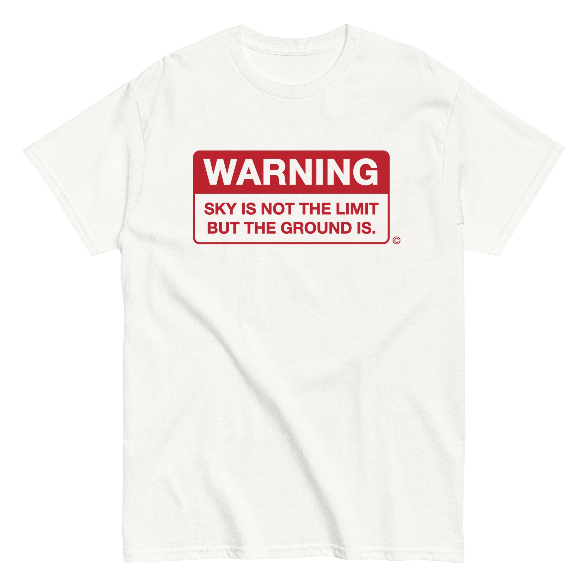 white t-shirt with quote in red "Warning sky is not the limit but the ground is"